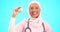 Nurse, healthcare and vaccine with a muslim woman on a blue background in studio for treatment. Medical, product and