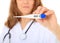 Nurse holding clinical thermometer