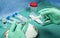 Nurse holds ampoule of anesthesia, preparation to extract cerebrospinal fluid to investigate causes in a person affected by