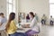 Nurse informs a young female patient about the benefits and possible side effects of the vaccine.