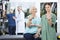 Nurse Instructing Senior Woman Exercising With Dumbbell