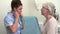 Nurse Listening To Senior Female Patient\'s Chest