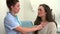 Nurse Listening To Teenage Female Patient\'s Chest