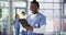 Nurse, man and research for healthcare on tablet, internet and studying report on tech. Black male person, hospital and