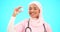 Nurse, medical and vaccine with a muslim woman on a blue background in studio for treatment. Healthcare, product and