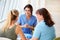 Nurse Meeting With Teenage Girl And Mother