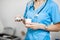 Nurse with pillbox and a cup of water