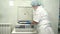 Nurse placing blood tubes in the laboratory centrifuge