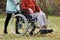 Nurse pushing wheelchair