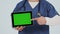 Nurse, tablet green screen and okay hands for success, healthcare services and presentation in studio. Doctor or medical