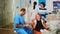 Nurse taking notes on clipboard about little girl dental problems