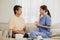 nurse teaches the elderly how to clean teeth at home