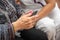 Nurse teaching elder woman how to use mobile phone, senior grandmother learning to use smartphone at nursing home