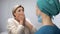 Nurse telling mature patient shocking news, terrified woman crying hysterically