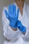 Nurse wearing protective gloves