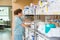 Nurse Working In Storage Room Of Hospital