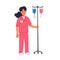 Nurse. Young nurse in pink scrubs holding a dropper stand. Medical team in conditions of coronavirus pandemic, fight