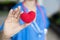 Nurser doctor hand showing heart sign for healthcare protect share care with love concept