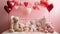 A nursery decorated with heart-shaped mobiles, blankets,