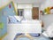 Nursery in white and blue with a high bed and a headboard in the shape of a house and striped wallpaper