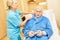 Nursing assistance looks after a sick senior