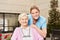 Nursing assistance and senior woman together