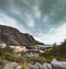 Nusfjord authentic fishing village with traditional red rorbu houses in autumn. Lofoten islands, Norway