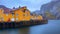 Nusfjord authentic fishing village with traditional yellow buildings. Lofoten islands, Norway. Blurred long exposure