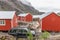 Nusfjord, Norway - June 20, 2017: Traditional red wooden houses, rorbuer in the small fishing village of Nusfjord, Lofoten islands