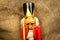 Nutcracker wooden figure of a soldier for cracking nuts. Traditional symbol of Christmas and New Year. Close up