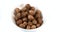 Nutmeg, myristica fragans, Nuts falling against White Background