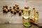 Nutmeg oil - perfume ingredient - on wooden background copy space