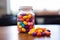 Nutrient-rich delight: Gummy supplements showcased in a glass jar, offering a burst of chewable vitamins