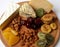 Nutrition. Closeup. Cheese plate. healthy food. Hard cheese. Blue cheese. fruit and nuts