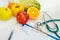 Nutrition and healthy eating. Fruits, vegetables and stethoscope