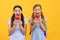 Nutrition for kids. Surprised children hold apples. School nutrition. Food education