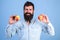 Nutritional choice. Man with beard hipster hold apple fruit in hand. Nutrition facts and health benefits. Apples popular