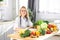 Nutritionist desk with healthy vegetables. Skilled professional dietitian working on diet plan