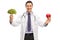 Nutritionist holding a broccoli and an apple