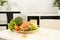 Nutritionist`s workplace with fruits, vegetables, measuring tape and body fat caliper