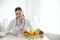 Nutritionist working at desk in office