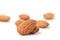 Nutritious  almonds scattered on white background with blurry