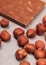 Nutritious chocolate and hazelnuts on cement structure