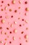 Nuts background - with almond, macadamia, walnut - on pink table top-down