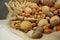 Nuts in a basket. beautiful still life close-up on a dark background.