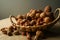 Nuts in a basket. beautiful still life close-up on a dark background.