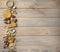 Nuts, dried fruits, honey and old spoons and forks on a wooden table background. Copy spase