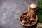 Nuts and spices for christmas cake in a wooden bowl