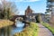 Nutshell Bridge and adjoing house on the Stroudwater Navigation near Stonehouse Stroud, England.