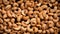 Nutty Perfection: A Close-up of Fresh Cashew Nuts on Seamless Background